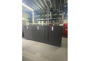 Проектування та монтаж системи опалення та кондиціювання для дилерського центру John Deere
